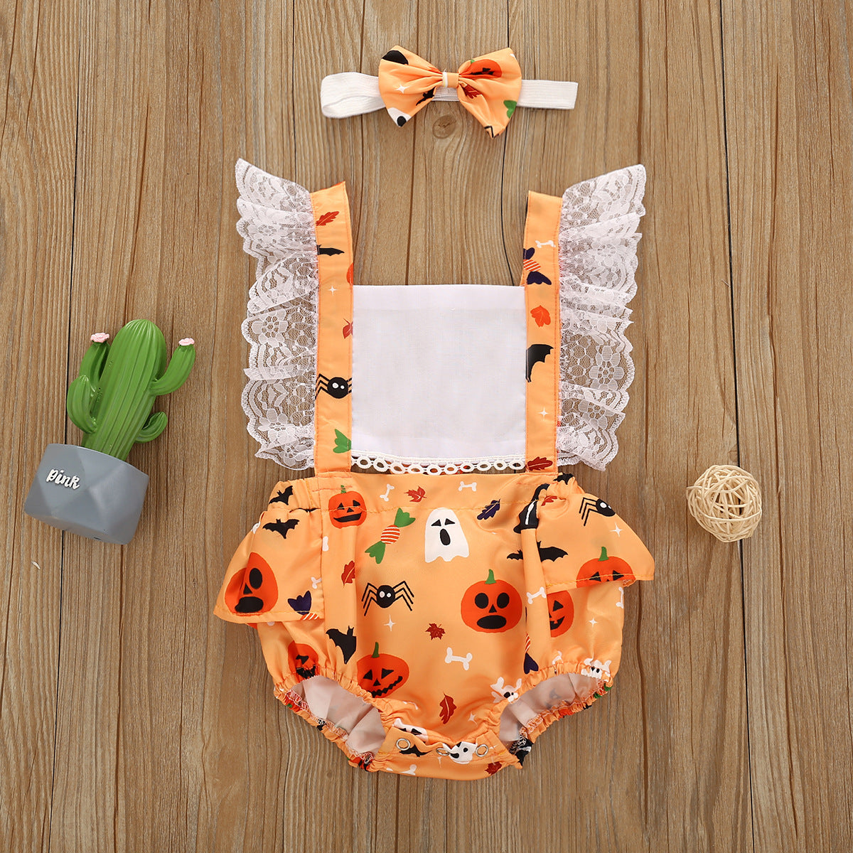 Printed pumpkin onesie